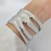 PAC-32 Pulsera Brazalete Lineas Onduladas Acero Quirúrgico